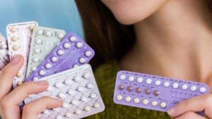 hormonal birth control for ovarian cyst treatment. can hormonal birth control cause cysts or cancer?